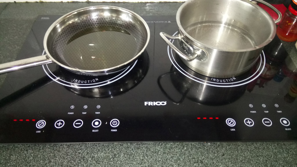 Dịch vụ thay mặt kính bếp từ Frico